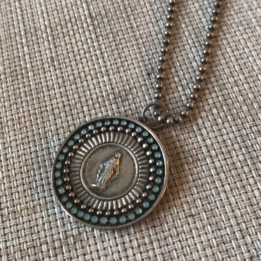 Virgin saints &angles pendant. With case